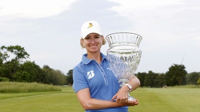 Karrie Webb poses with a trophy at Seaview in 2013.