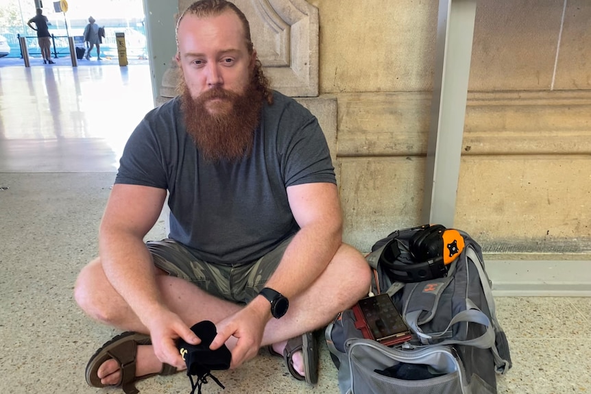 A man sitting on the ground