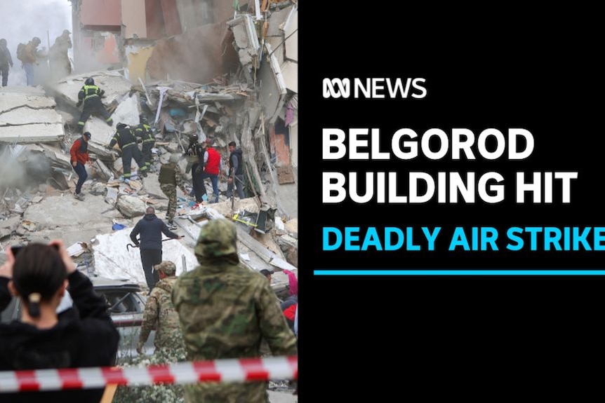 Belgorod Building Hit, Deadly Air Strike: Woman takes photo of destroyed building as emergency services pick through rubble