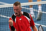 Hewitt celebrates a point