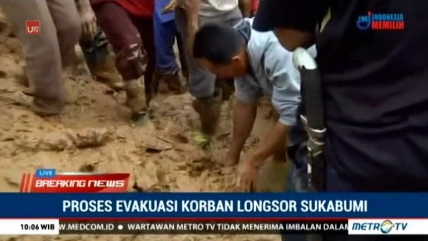 Rescue teams and volunteers are searching for survivors after a landslide in Java