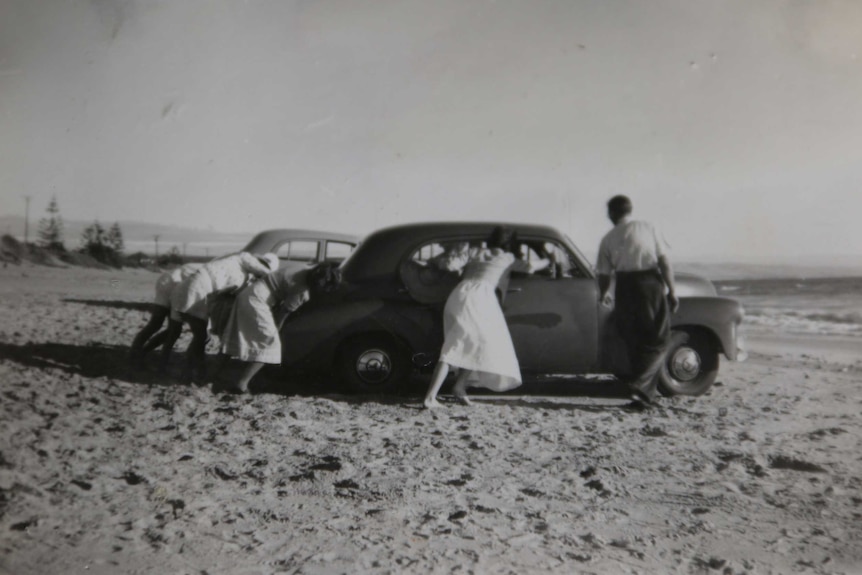 The Holden family at the beach.