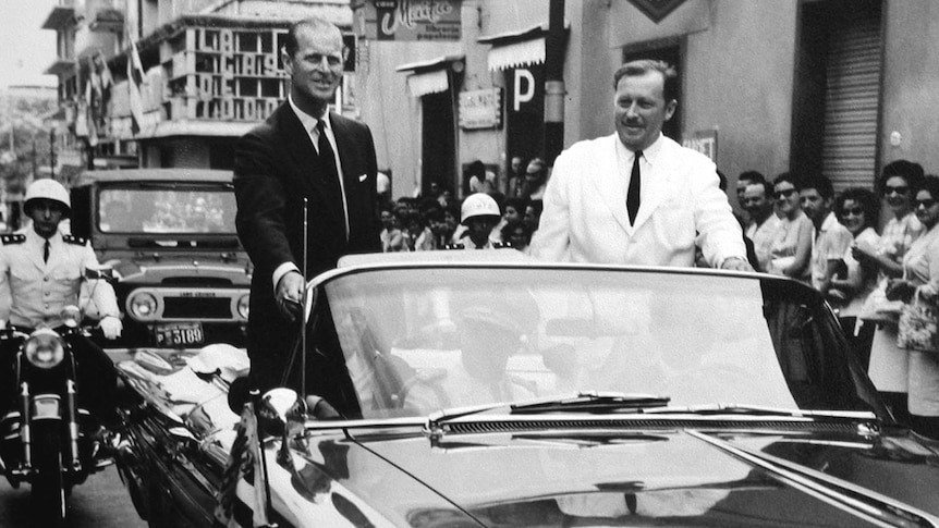 Paraguayan dictator Alfredo Stroessner rides with Prince Philip in downtown Asuncion, Paraguay, in 1963