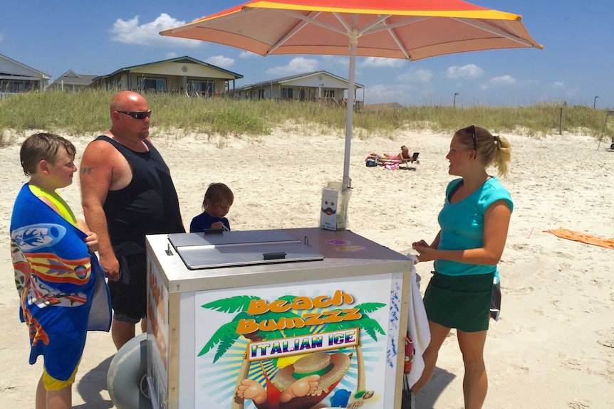 Beachgoers at Oak Island