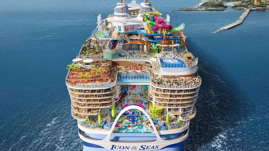 Aerial shot of the Icon of the Seas, with a tangle of colourful waterslides at the back.