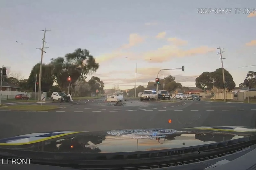 Police dash cam footage capture of high speed crash