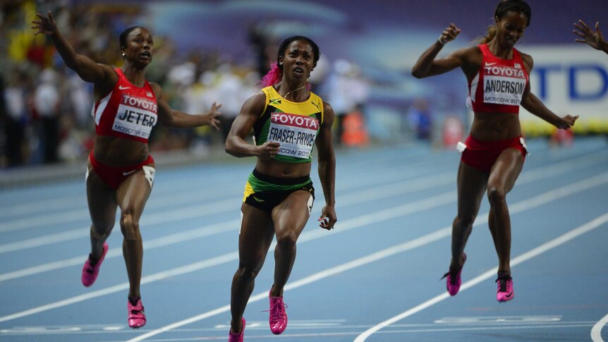 Jamaica's Shelly-Ann Fraser-Pryce (centre) wins the women's 100 metres final