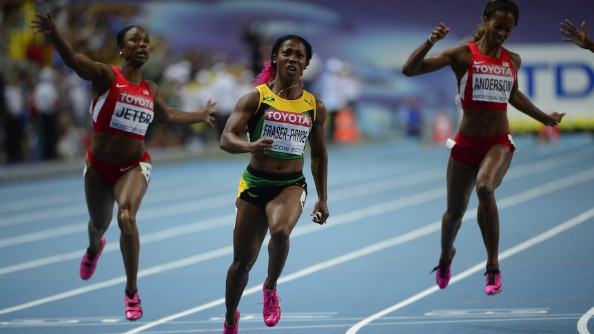 Jamaica's Shelly-Ann Fraser-Pryce (centre) wins the women's 100 metres final