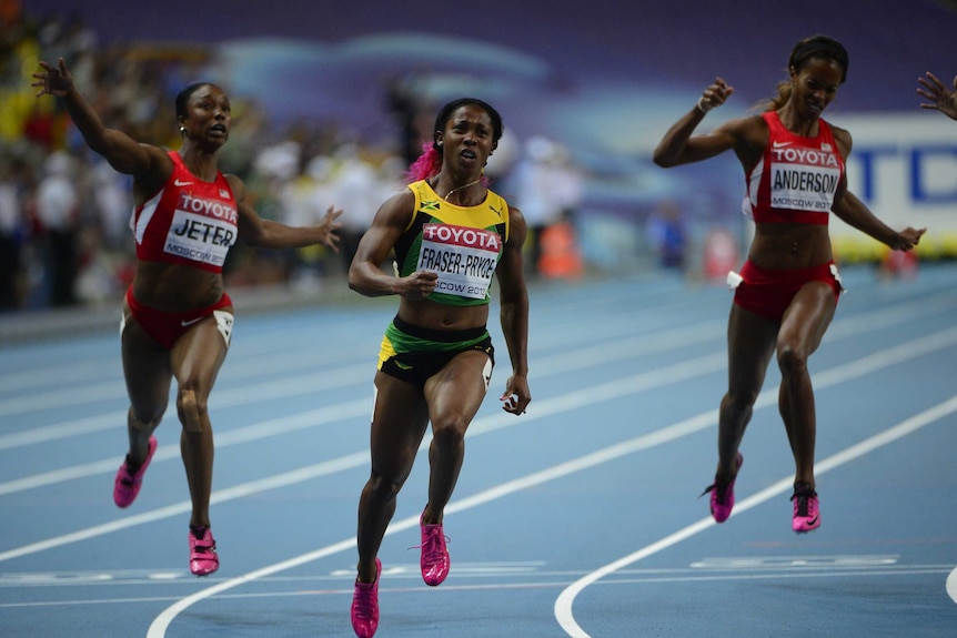 Jamaica's Shelly-Ann Fraser-Pryce (centre) wins the women's 100 metres final