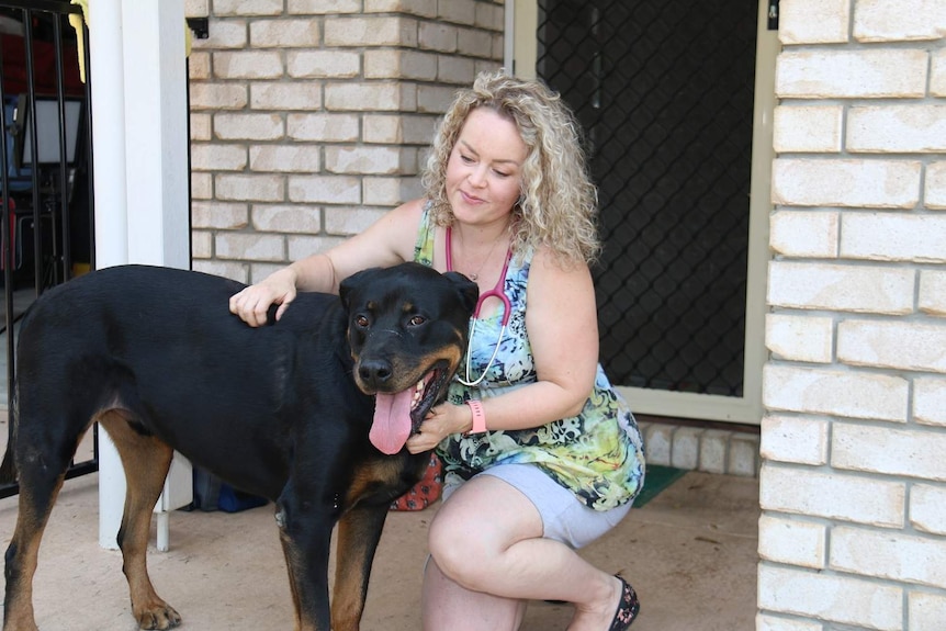 Griffin with veterinarian Dr Annika Oksa.