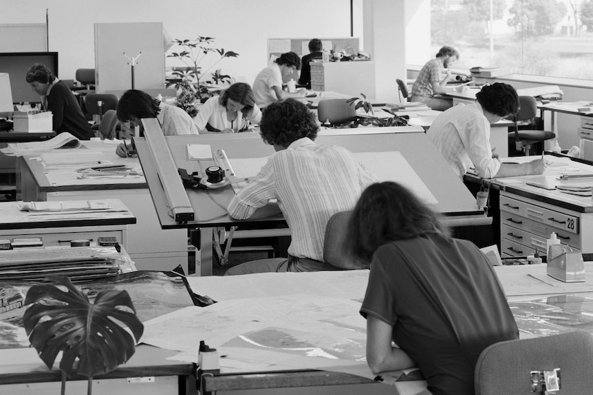 The WA Water Corporation technical drawing staff at work at desks