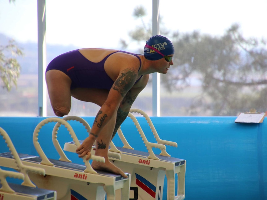 Sonya Newman, a member of Australia's Invictus swimming team, on the starting blocks.