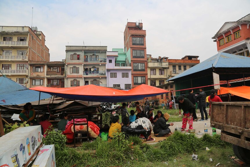 People under tarps in Kathmandu