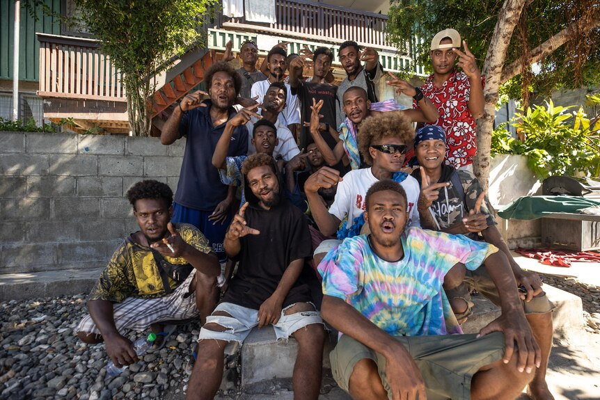 Group of young people in Solomon Islands posing.
