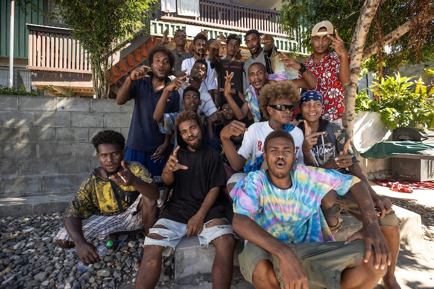 Group of young people in Solomon Islands posing.