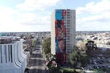 An aerial shot of the 20-storey mural on the Collingwood public housing tower.