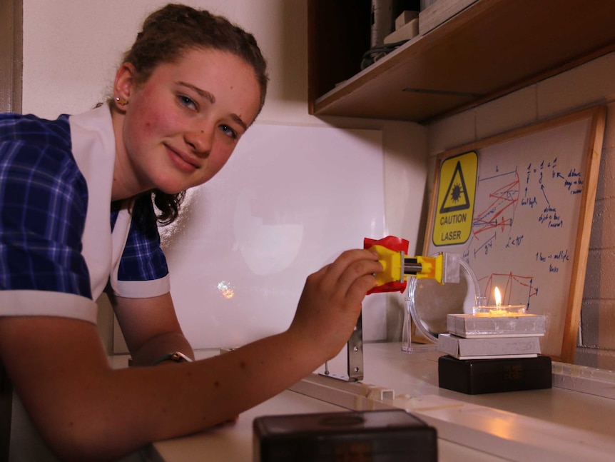 Canberra high school student Maddi Ingram conducting a science experiment.