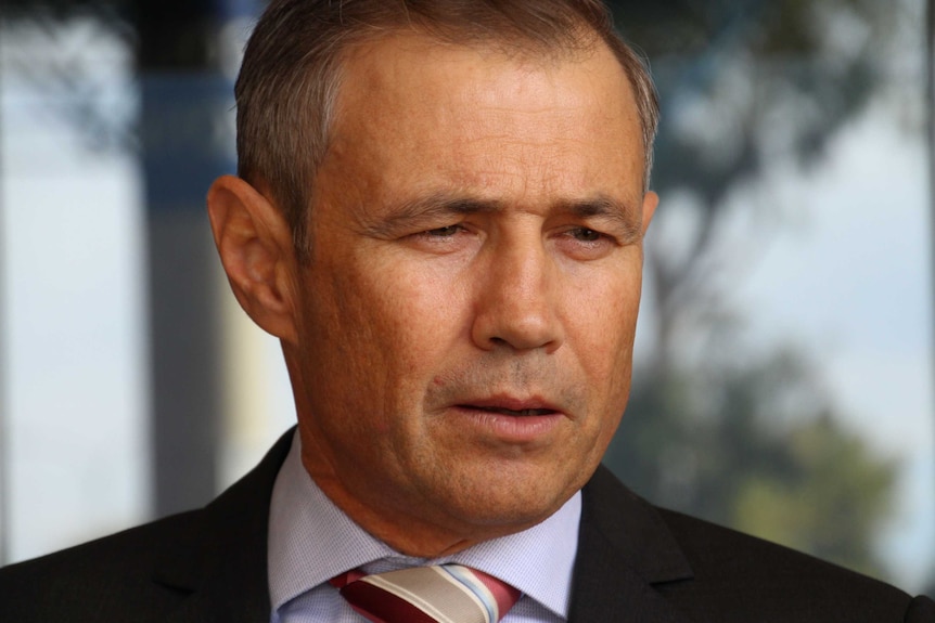A tight head shot of WA Health Minister Roger Cook.