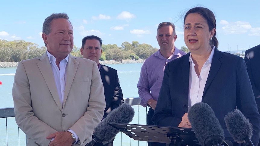 Andrew Forrest and Annastacia Palaszczuk stand together at a media conference in Gladstone.