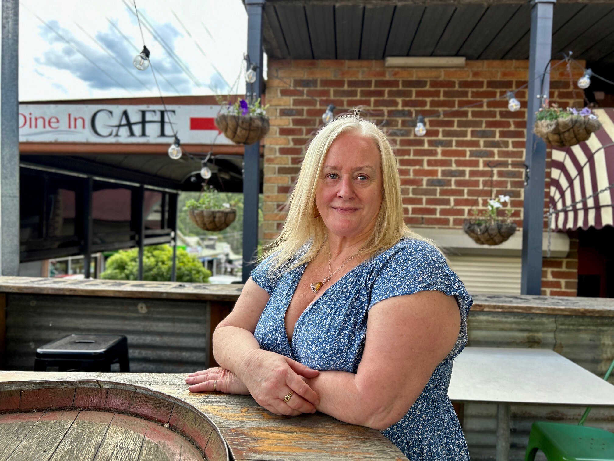 A woman wearing a floral dress