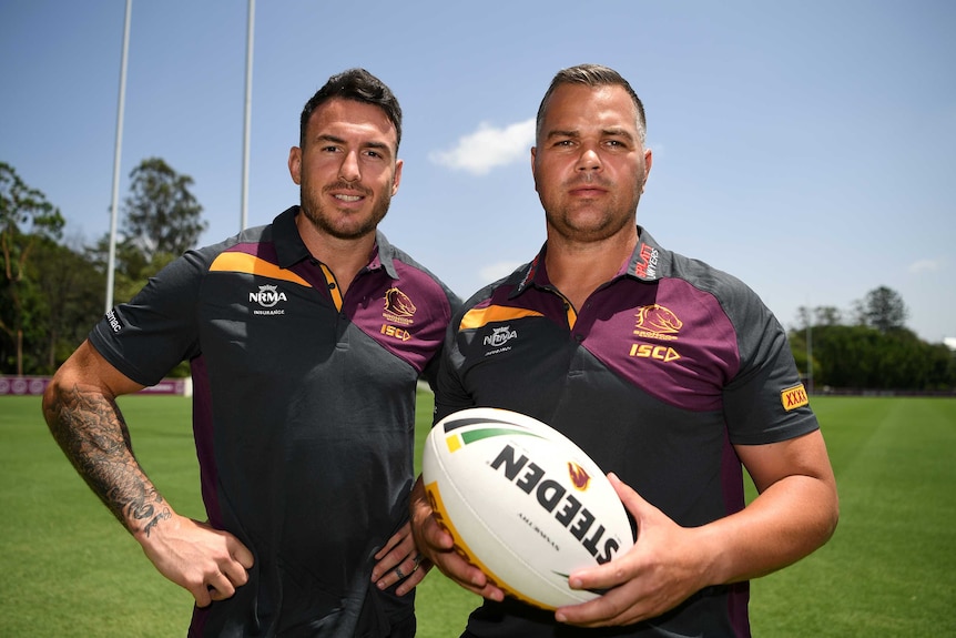 New Broncos coach Anthony Seibold poses with captain Darius Boyd