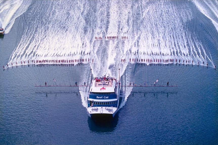 100 water skiers set a new world record by skiing behind the one boat in Trinity Inlet, Cairns, on October 18, 1986.