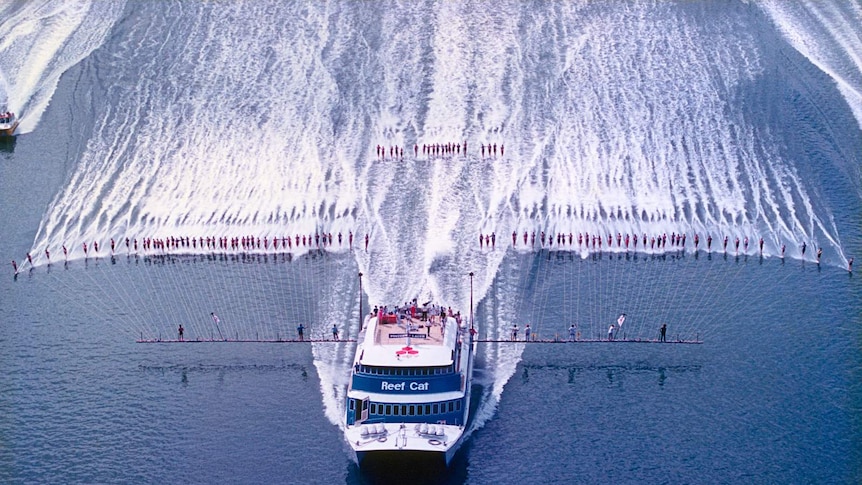 100 water skiers set a new world record by skiing behind the one boat in Trinity Inlet, Cairns, on October 18, 1986.