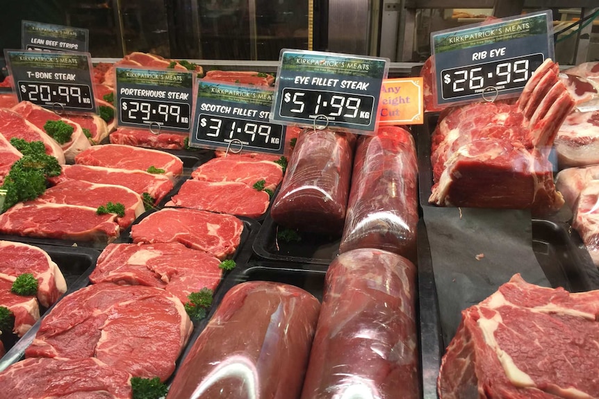 Meat sit in a butcher's window