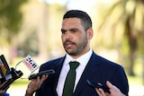 Rugby League player Greg Inglis in front of journalists