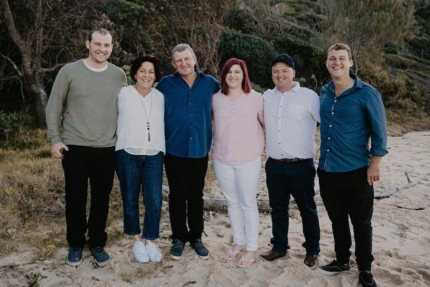 A family on a beach