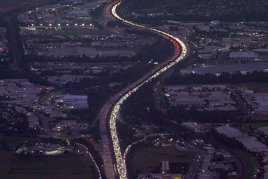 A traffic jam seen from the air at night.