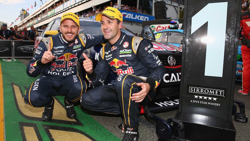 Holden drivers Jamie Whincup and Paul Dumbrell celebrate after race two at the Gold Coast 600.