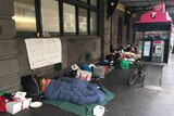 People sleeping outside Flinders Street station in Melbourne.