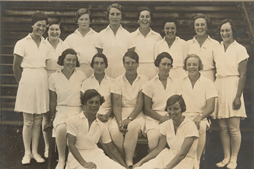 A black and white image of the women's English cricket team.