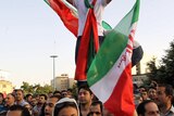 Iran fans celebrate qualifying for the 2014 World Cup