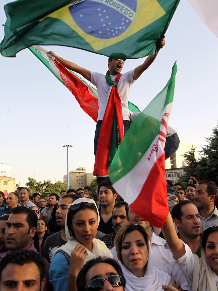 Iran fans celebrate qualifying for the 2014 World Cup