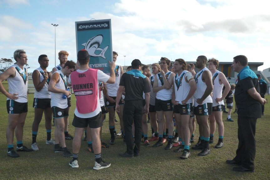 Albany Sharks huddle in 2020