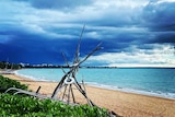 dark clouds over a beach