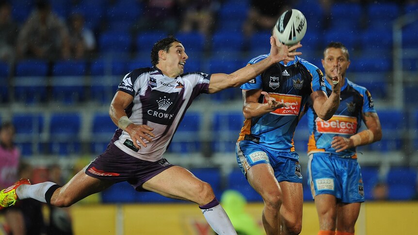 Slater hauls in a cross-field kick ahead of Beau Champion to score a miracle try.