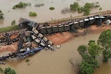 The train derailed in floodwaters.