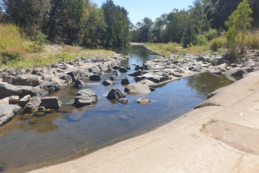 a rocky creek with some water in it