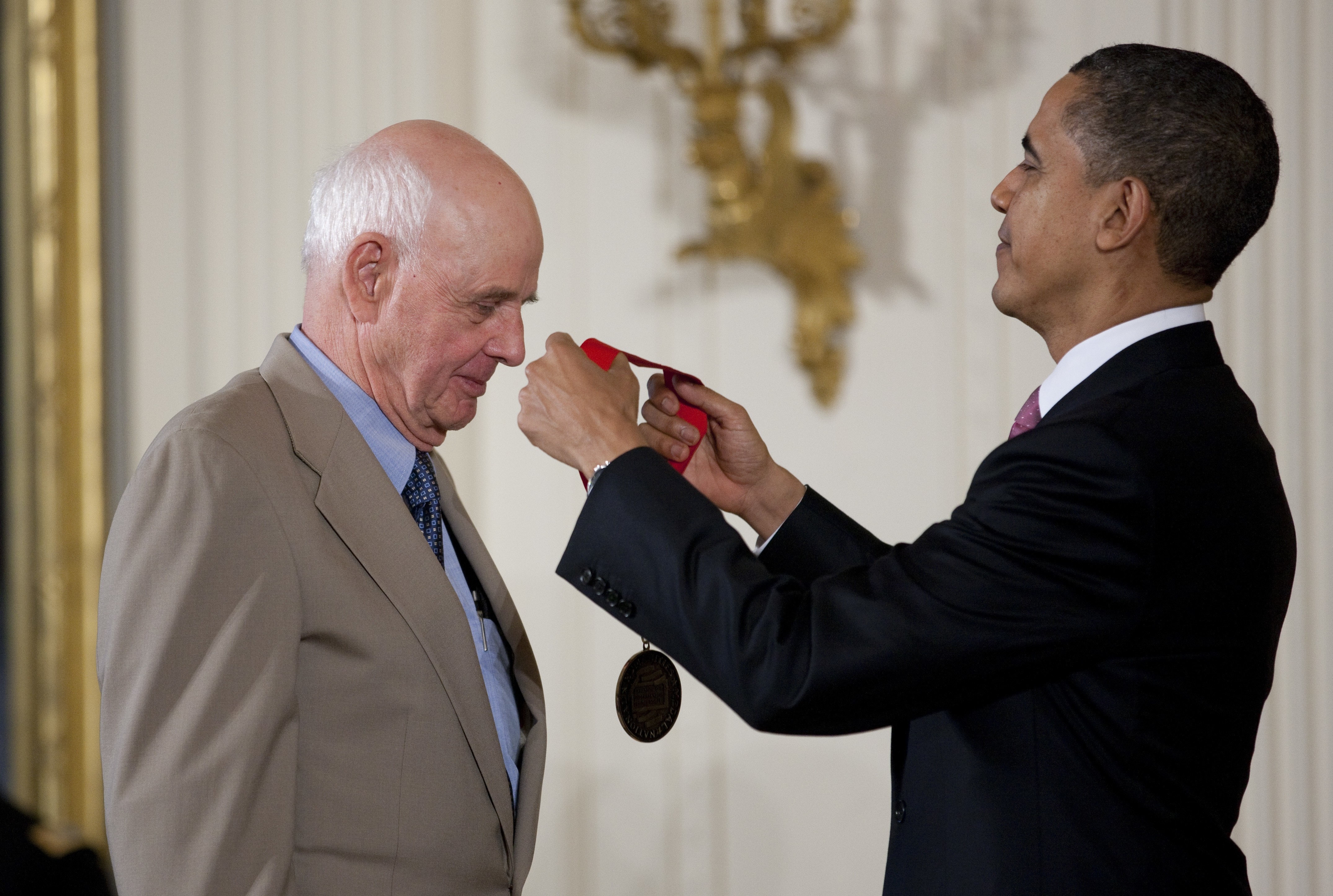 President Barack Obama presents a 2010 National Humanities Medal to poet and farmer Wendell Berry