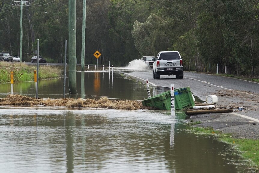 A road at Moore Park in Bundaberg remains flooded after torrential rains.