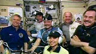Welcome aboard: The astronauts have held a link-up with relatives of Ms Ansari.