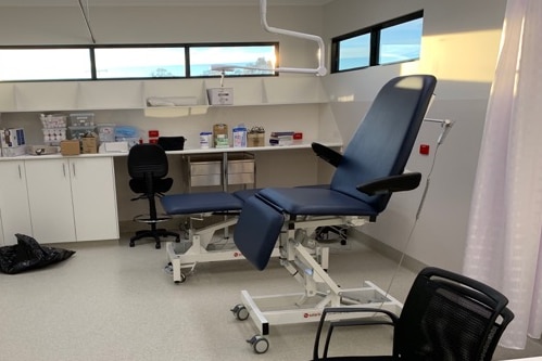 A doctors surgery consulting room with dentist chair 