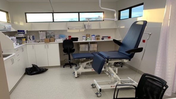 A doctors surgery consulting room with dentist chair 