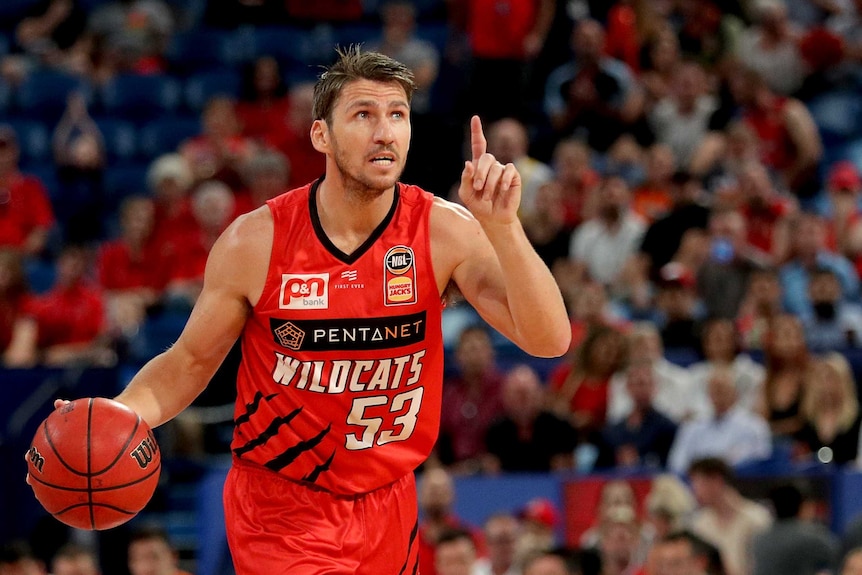 Damian Martin signals during the third NBL Semi-Final match between the Perth Wildcats and the Cairns Taipans.