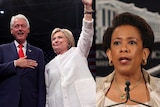 A composite image of Bill and Hillary Clinton, and US Attorney-General Loretta Lynch.