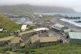 Cloud hangs over the hills at the Macquarie Island base station.