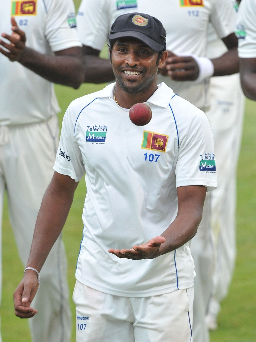 Chanaka Welegedara of Sri Lanka walking off the field smiling